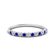 diamond-bezel-set-thin-stack-band-with-sapphire-in-white-gold-FDWB1408BGSABLANGLE3-NL-WG.jpg